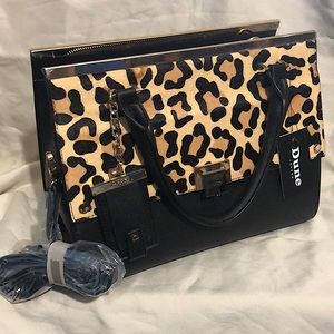 Dune London Crossbody or a hand held bag.